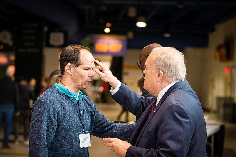 Billy Deters receiving communion