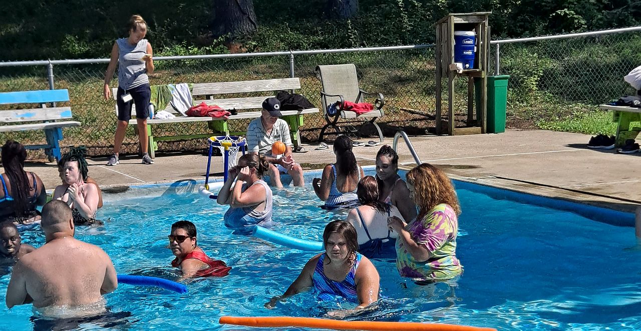 campers in swimming pool